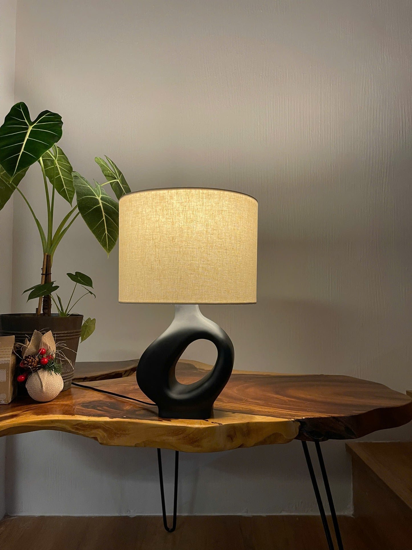ORBITAL VOID A Sculptural Wooden Table Lamp with Matte Black Eleganc