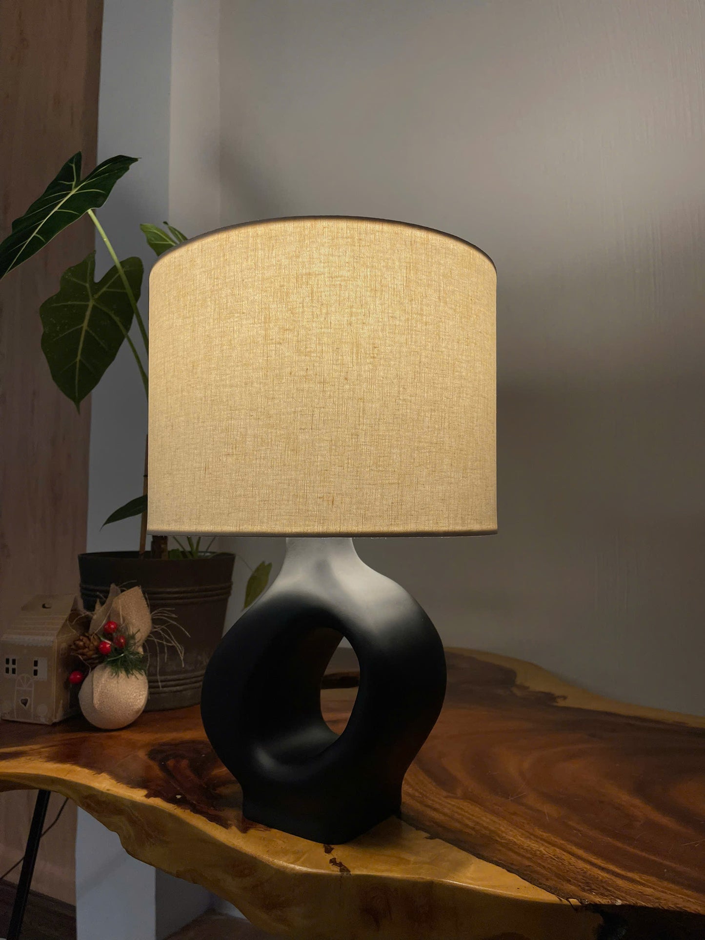 ORBITAL VOID A Sculptural Wooden Table Lamp with Matte Black Eleganc