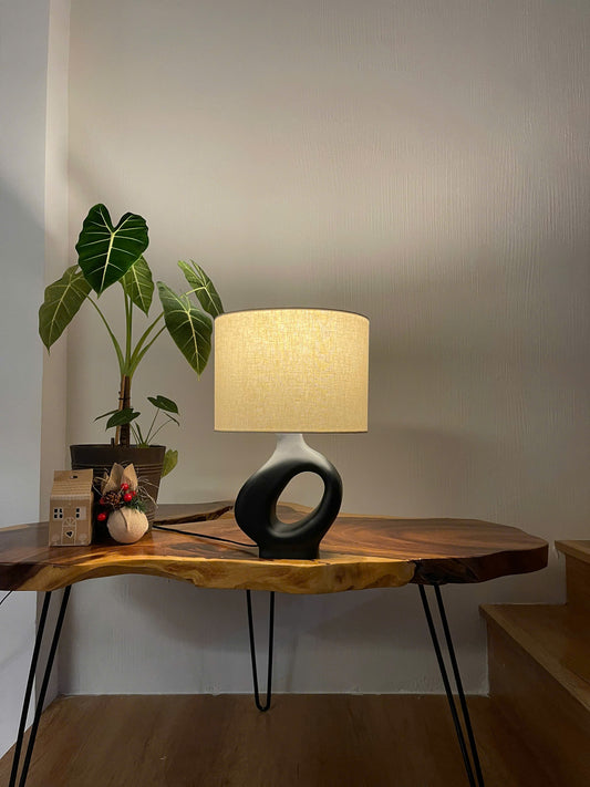 ORBITAL VOID A Sculptural Wooden Table Lamp with Matte Black Eleganc